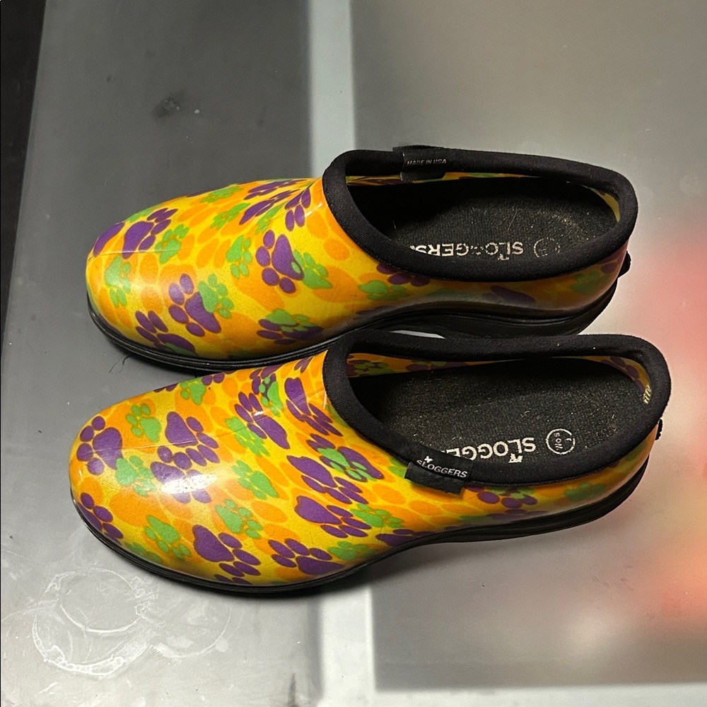Sloggers Vibrant Yellow Clogs with Purple and Green Paw Prints - Picture 2 of 10